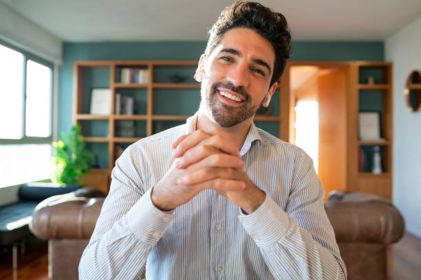 istock Business man on a work video call from home. 1308476129