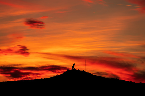 Ataturk silhouette. Climb the mountain with a magnificent cloudy sky sunset.