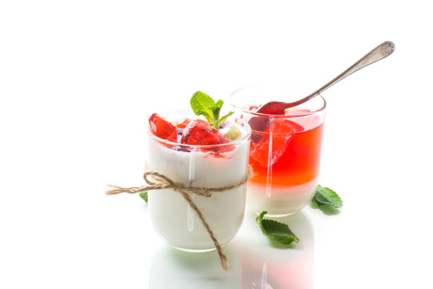 homemade sweet yogurt with fruit jelly pieces in a glass