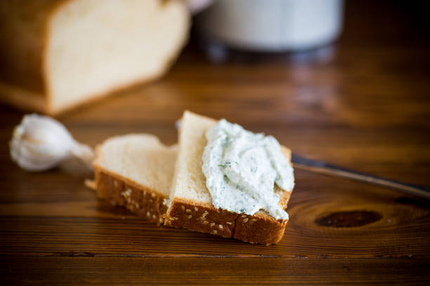 istock homemade salted curd spread with herbs and garlic 1308479133