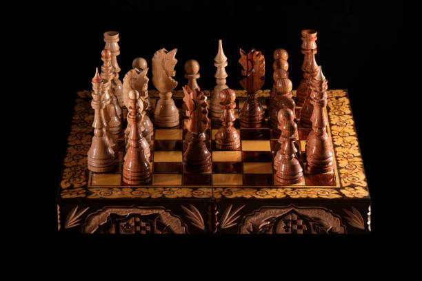 istock Checkmate to the white king from the black queen on the chessboard. Black won chess 1308481463