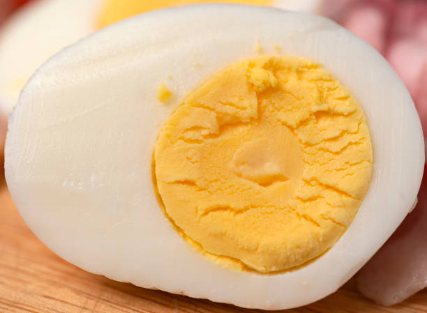istock Hard boiled egg cut in half. Beautiful macro shot. 1308486892