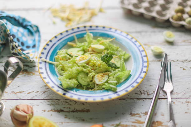 istock Healthy salad with quail eggs and cucumbers 1308486956