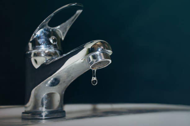 istock Close-up of the dripping tap 1308488252