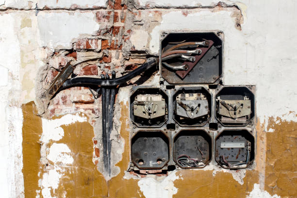 istock The wall with the old electrical installation - background 1308499076