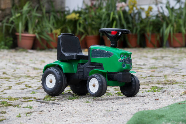 istock Green tractor, a child´s toy. 1308502433