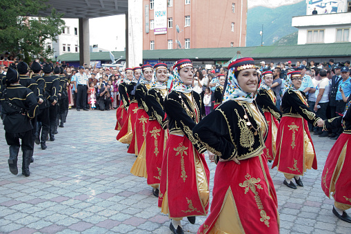Female dancers in ethnic costumes dancing on the street,Artvin,Turkey. 18 June 2014.