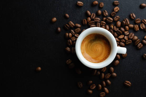 istock Coffee in cups with coffee beans 1308506926