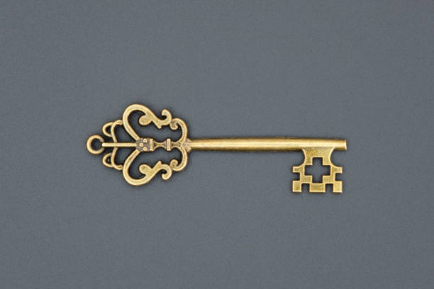 istock old ornate golden decorative key 1308507679