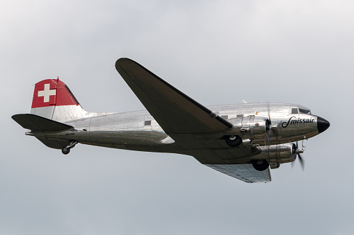 Payerne, Switzerland - August 30, 2014: Douglas DC-3C vintage airliner N431HM departing Payerne Airport.