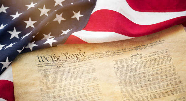 American Flag and the United States Constitution stock photo