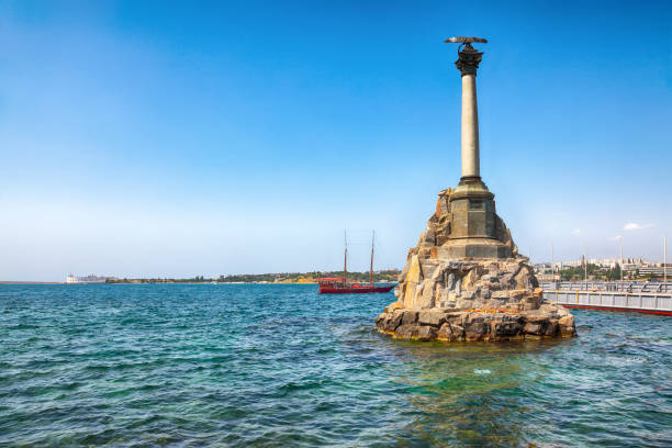 Iconic monument to the sunken ships in Sevastopol Bay. Iconic monument to the sunken ships in Sevastopol Bay. Crimea scuttle stock pictures, royalty-free photos & images