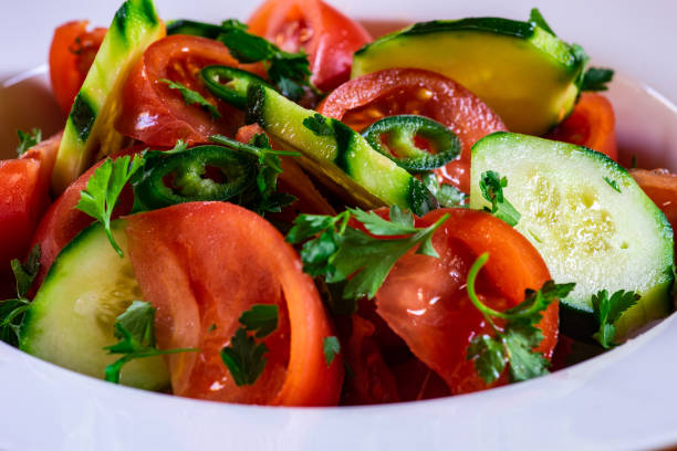 istock Healthy vegetable salad with spicy pepper 1308512010