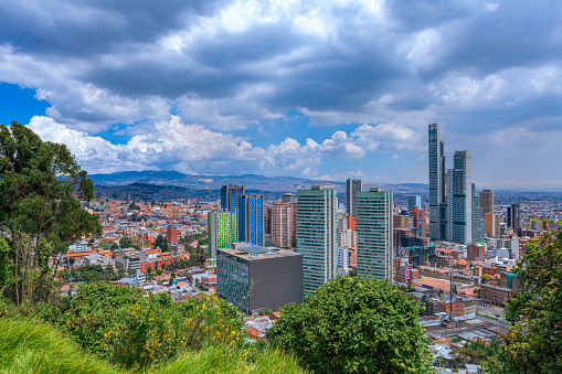 Bogotá, Colombia - Looking at a high angle view of BD Bacatá from a higher altitude on the Andes Mountains. The BD Bacatá with 67 floors on the South Tower, is the tallest building in Colombia and the 6th tallest in South America. The actual altitude of the Bogota, Colombia's capital city, at street level is about 8,500 feet above mean sea level. It is one of the largest cities of South America with a population of almost 10 million people. Image shot on a clear morning on the Andes Mountains.