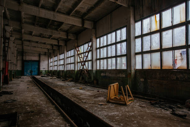 istock Abandoned ruined large industrial hall 1308512788
