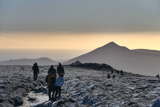 People enjoying hiking and winter Irish weather during coronavirus lockdown, Dublin/Wicklow Mountains, Ireland stock photo