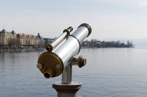 A close up of coin-operated beach binoculars.