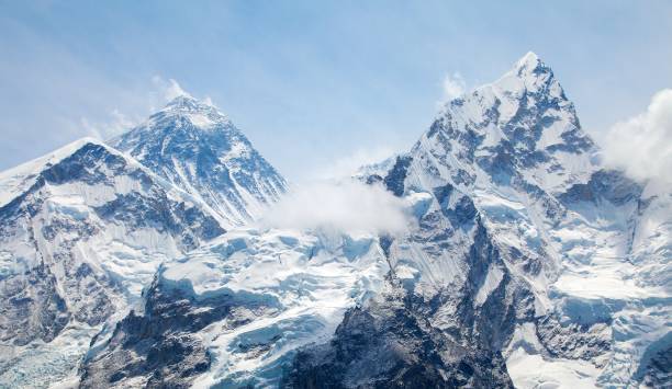 Mount Everest and Nuptse with clouds from Kala Patthar View of top of Mount Everest and Nuptse with clouds from Kala Patthar way to mount Everest base camp, khumbu valley, Nepal himalaya mountain Icefall stock pictures, royalty-free photos & images