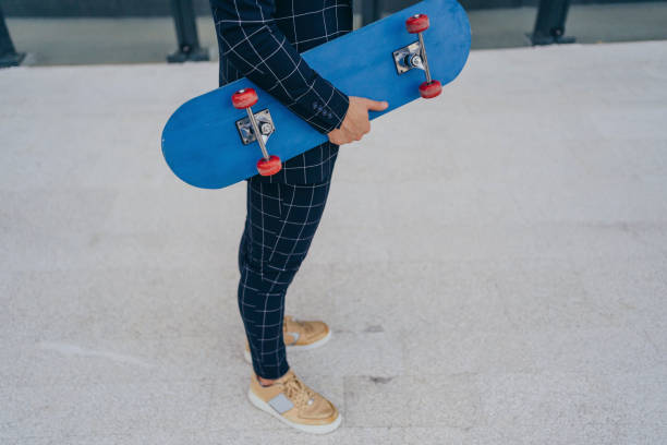 istock Businessman with skateboard 1308518981