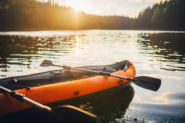 istock Kayak boat near a lake at sunset. 1308520931