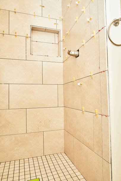 istock New Shower Stall with Grout Spacers for new tile installation 1308524169