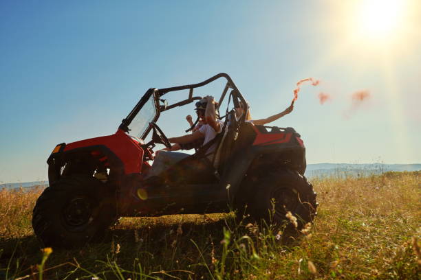 istock colorful torches while driving a off road buggy car 1308524268