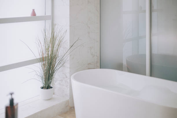 istock luxury bathroom in apartment with bathtub 1308526306