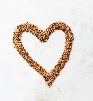 Large buckwheat love heart on marble texture￼