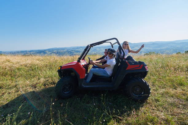 istock group young happy people enjoying beautiful sunny day while driving a off road buggy car 1308539925