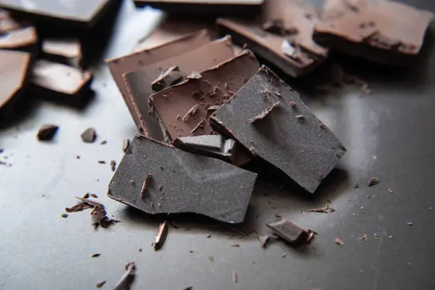pieces of chocolate on black dish