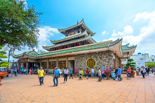 An Giang, Vietnam - March 6th, 2021: Tourists visit Chua Xu temple to pray for peace for everyone in the full moon of the first lunar month. This place female saint shrine worship in An Giang, Vietnam.