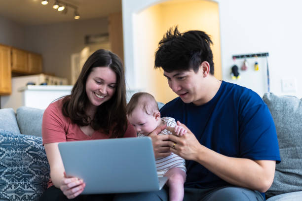 istock Young Couple with baby 1308546492