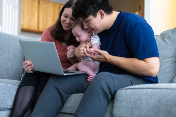 istock Young Couple with baby 1308546532