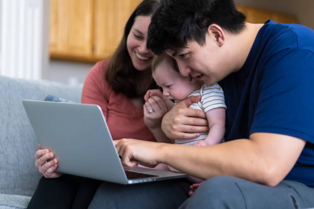 istock Young Couple with baby 1308546533