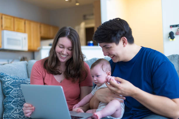 istock Young Couple with baby 1308546598