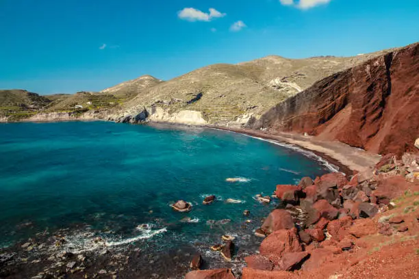 Red beach or red rock ?  Whichever it is, it is very impressive !  The moment I saw the color, I had to admit that it was really red. Red beach in Santorini is one of the tourist spots. You definitely visit there. What makes the beach red ?  It is because of the volcanic rock nearby. Unfortunately we couldn't go the beach and had to look at it from this rocky viewpoint