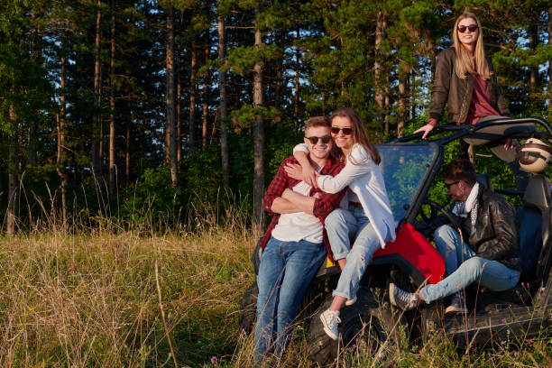 istock group young happy people enjoying beautiful sunny day while driving a off road buggy car 1308552210