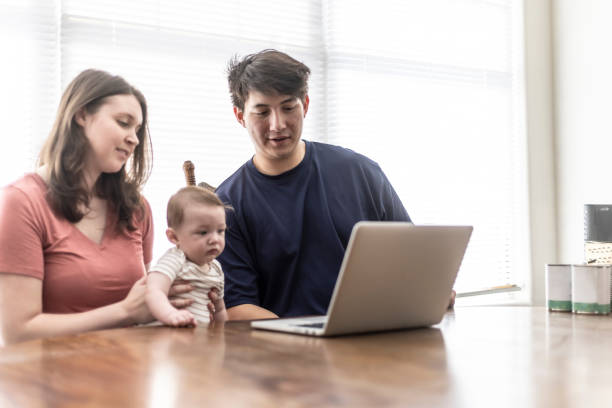 istock Young Couple with baby 1308554530