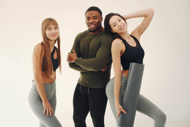 istock Sports group standing on a white background 1308556614