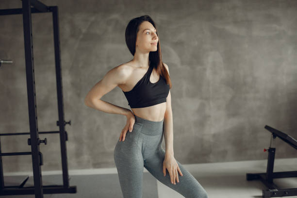 istock A beautiful girl is engaged in a gym 1308556698