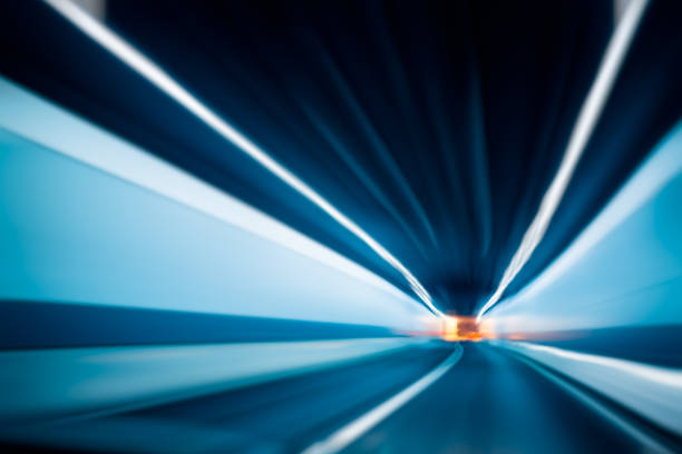 istock Motion blurred car in tunnel 1308556727