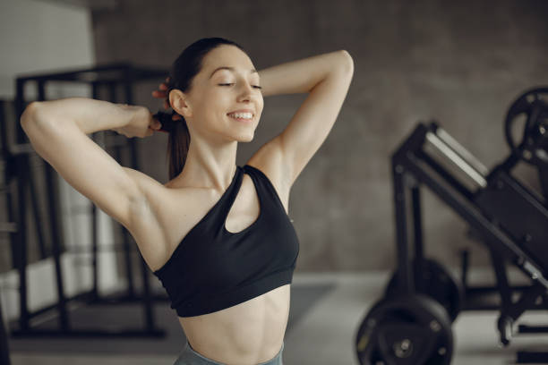 istock A beautiful girl is engaged in a gym 1308556740