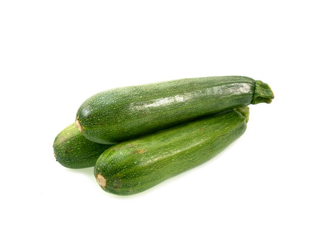 istock fresh green zucchini isolated on white background 1308557861