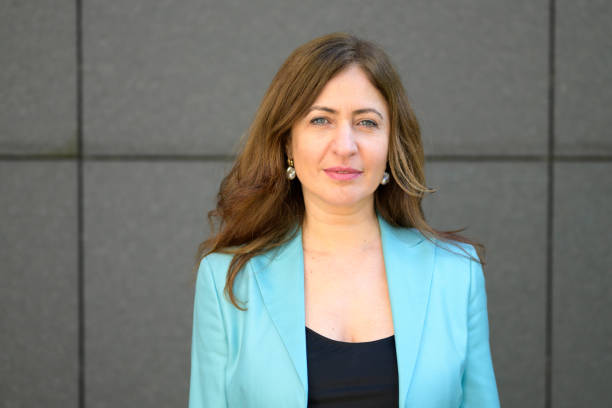 istock Attractive stylish middle-aged woman with a friendly smile 1308559074