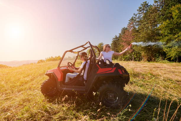 istock colorful torches while driving a off road buggy car 1308562391