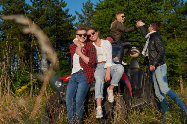 istock group young happy people enjoying beautiful sunny day while driving a off road buggy car 1308564913