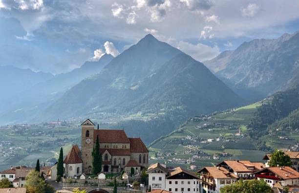 istock Urban skyline against thunderstorm in the mountains 1308566080