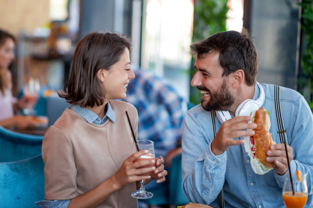 istock Young cheerful couple have breakfast 1308567117