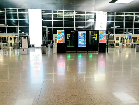 February 28, 2020 – Catania, Sicily. A view from inside the terminal waiting area of Catania Airport in SIcily, Italy. The airport almost empty due to the Coronavirus pandemic.