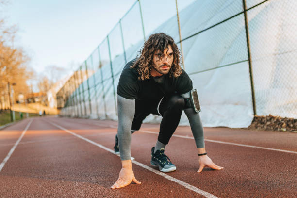 istock Man on starting line -sport outside 1308569710
